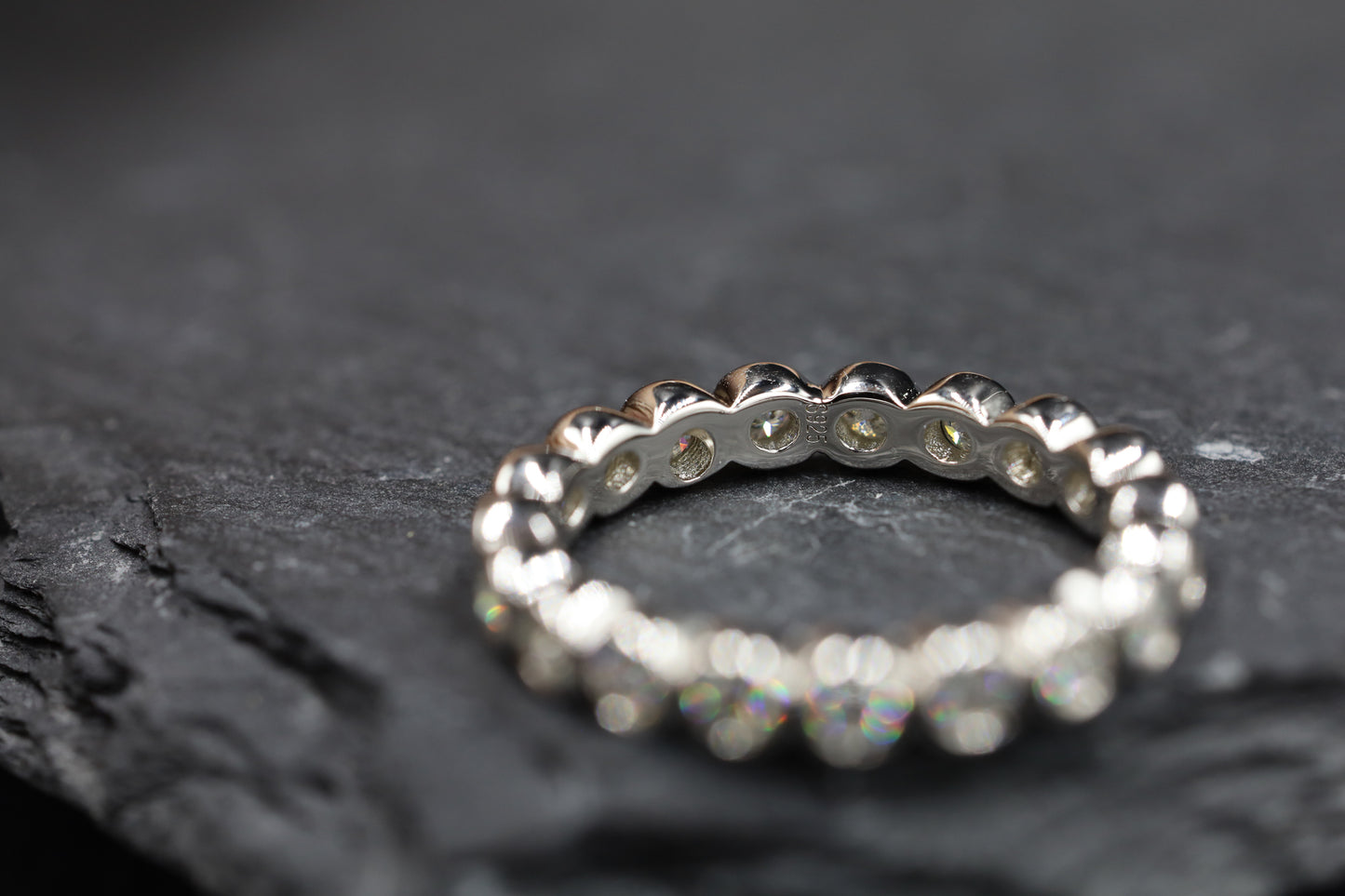 Round Moissanite Bezel Set Sterling Silver Eternity Ring