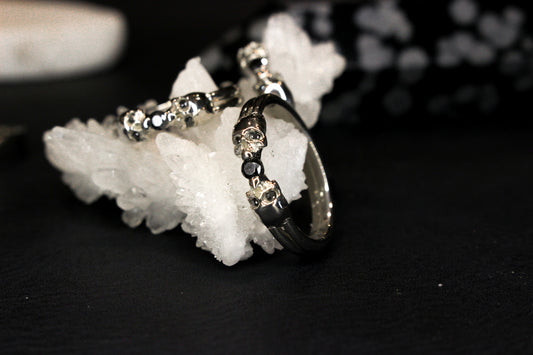 Sterling Silver and Black Moissanite Bezel Ring with Skulls