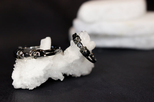 Black Metal and Black Moissanite Bezel Ring with Skulls