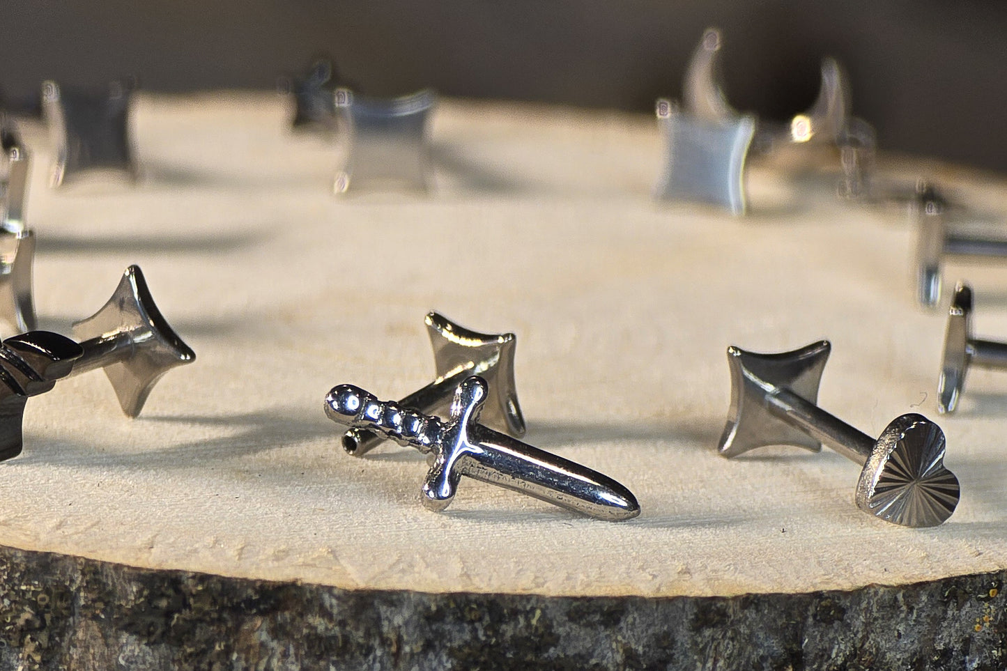 silver dagger and cut heart lux punk starback threadless earrings