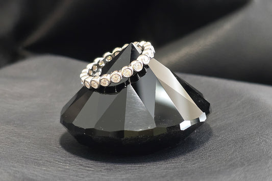 Round Moissanite Bezel Set Sterling Silver Eternity Ring
