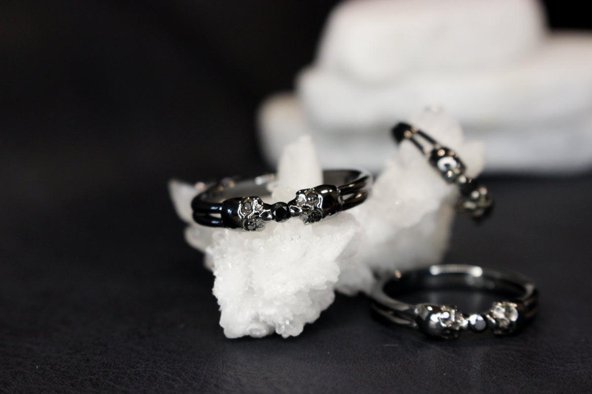 Black Metal and Black Moissanite Bezel Ring with Skulls